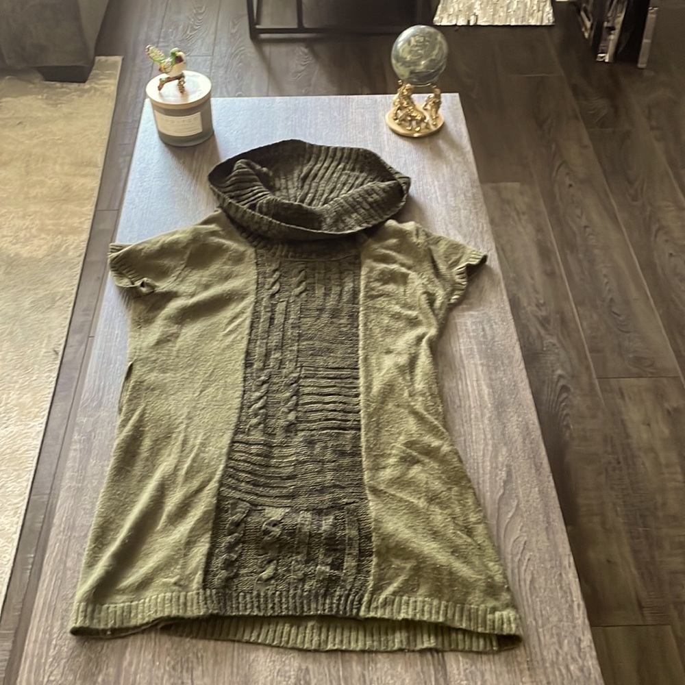 An cow neck sweater, stark green and swap green.